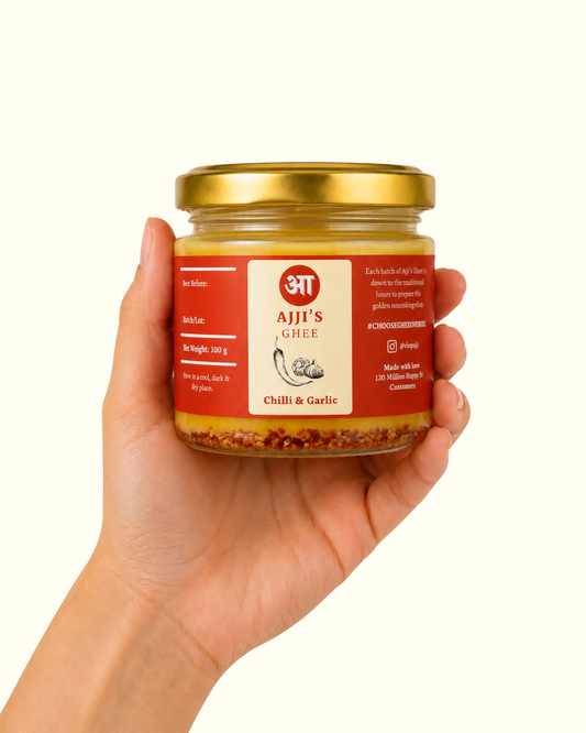 Jar of Ajji’s Chilli Garlic Ghee, flavoured cultured ghee for potatoes and rice bowls